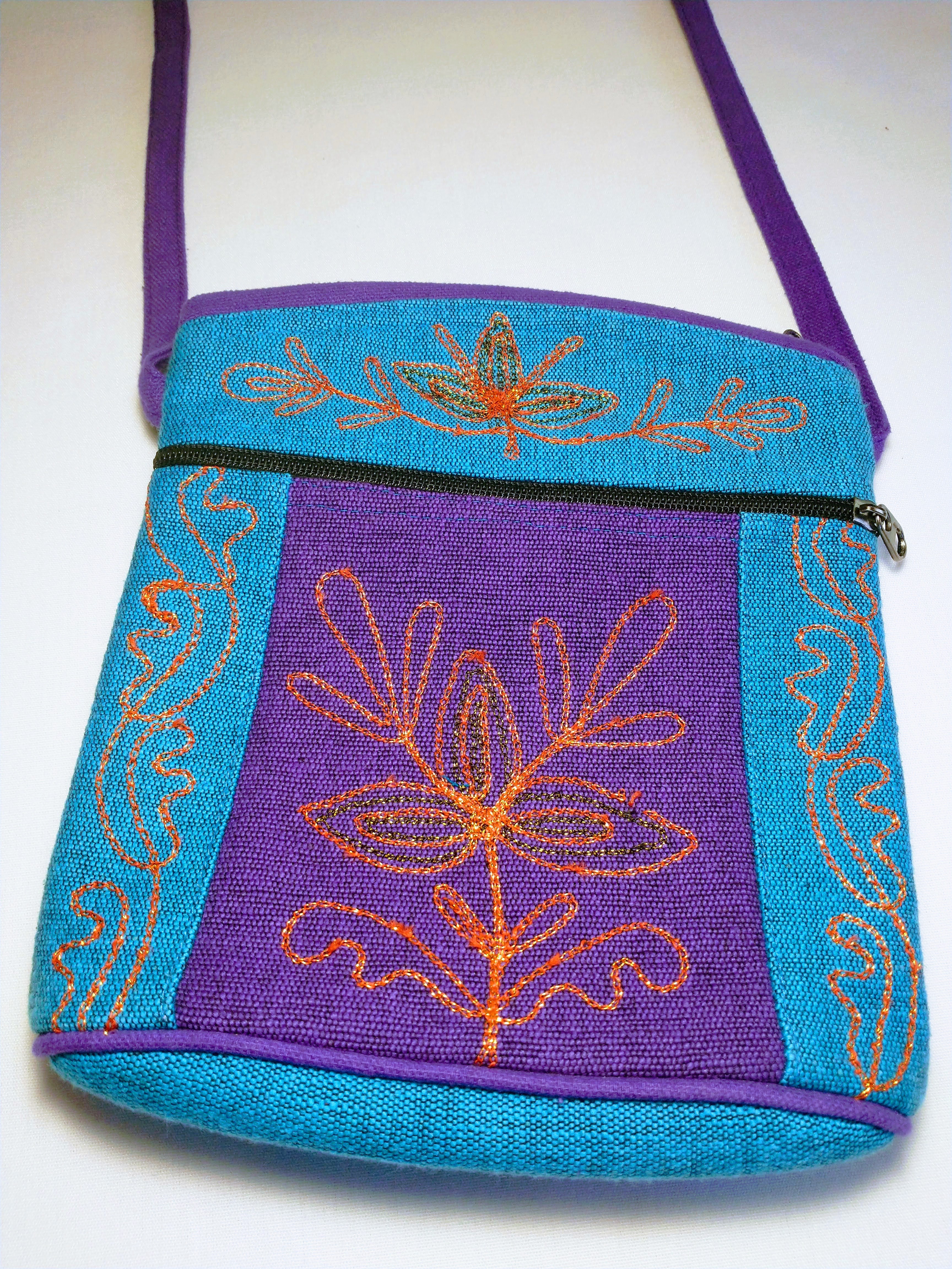 crossbody with blue and purple and leaves